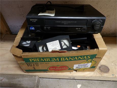 SHARP PLAYER W / TAPES