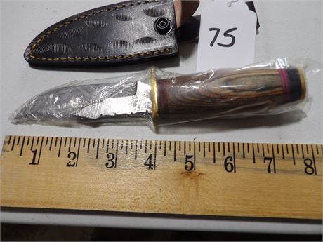 UNUSED 8" KNIFE