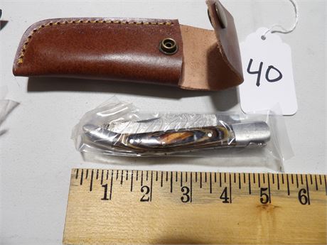 UNUSED 5" FOLD UP KNIFE