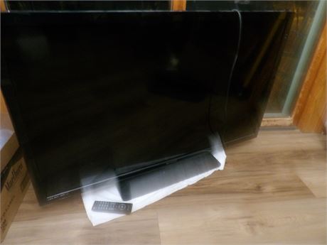 52" EMERSON FLAT SCREEN TV W / REMOTE ( WORKED WHEN REMOVED )