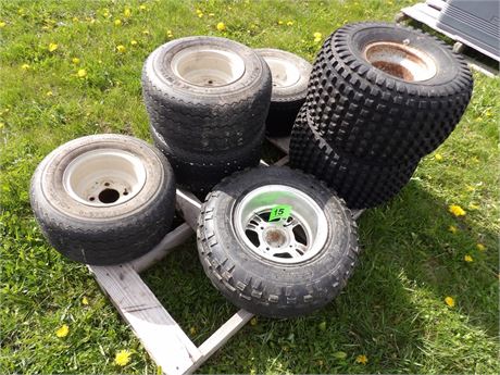 ASSORTMENT OF UTILITY TIRES W / RIMS