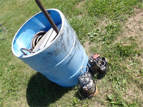 BARREL WITH POTS AND PANS - SUMP PUMPS