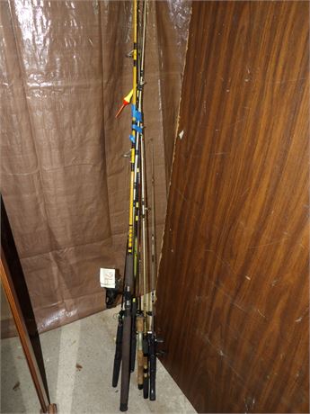 LARGE ASSORTMENT OF FISHING POLES ( TABLE NOT INCLUDED )