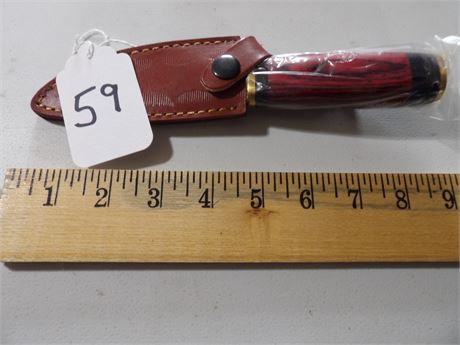 UNUSED 9" KNIFE