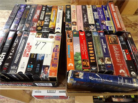 VHS MOVIES  ( 2 FLATS )