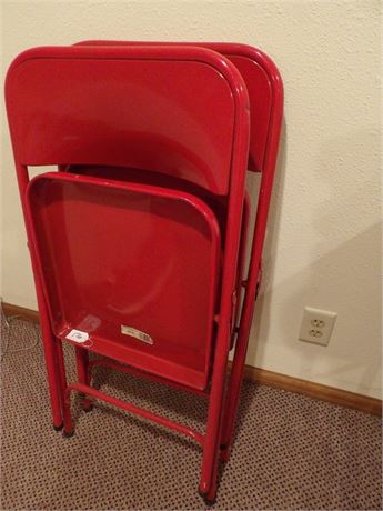 2 RED METAL FOLDING CHAIRS