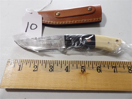 UNUSED 7" KNIFE WHITE/BLACK