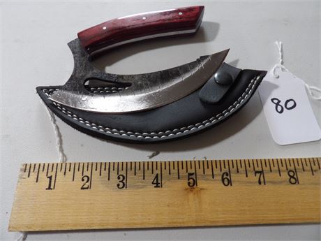 UNUSED 7" CURVED KNIFE