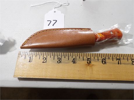 UNUSED 7" KNIFE