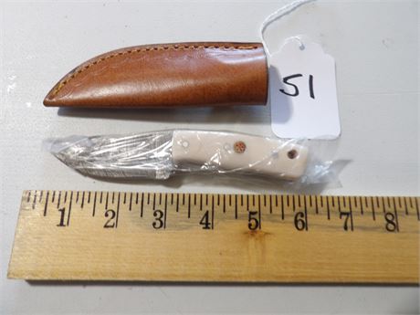 UNUSED 6" KNIFE   WHITE
