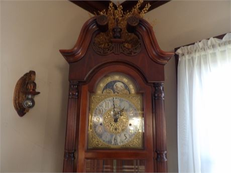 GRANDFATHER CLOCK ( WORKS OUT OF TIME )