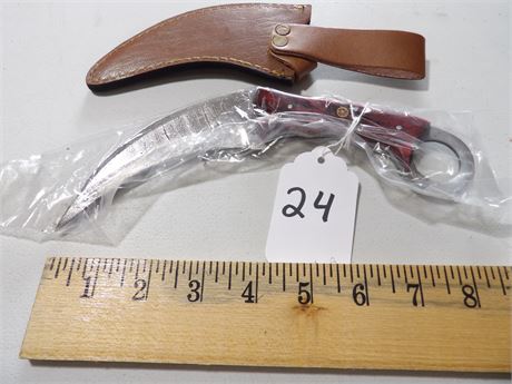 UNUSED CURVED 9" KNIFE