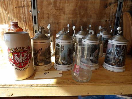 LARGE ASSORTMENT OF WOLF STEINS