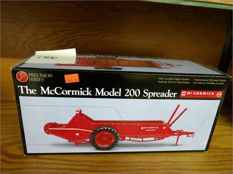 Mc CORMICK  MODEL 200 SPREADER  ( PRECISION )